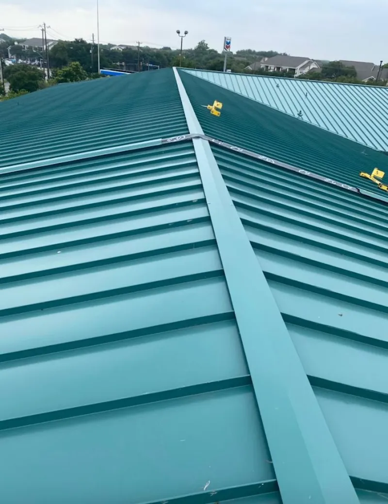Green commercial metal roof ridge and valley for Metal Roof Repair in Warrenton