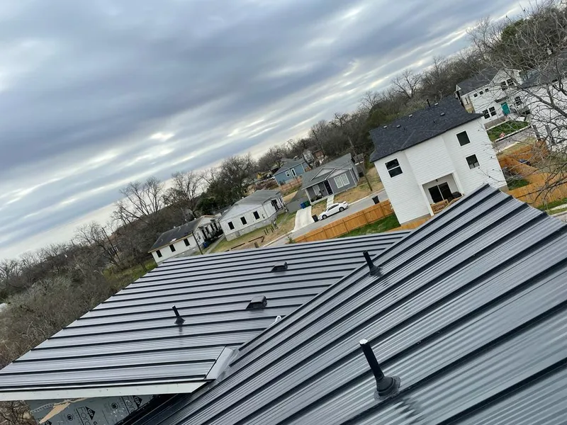 Standing seam metal roof panels with vents for Skylight Repair in Warrenton